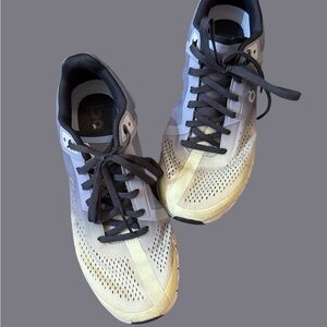 On Running Gray and Yellow Sneakers